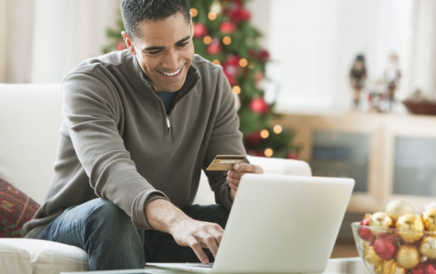 A consumer entering his credit card numbers online.