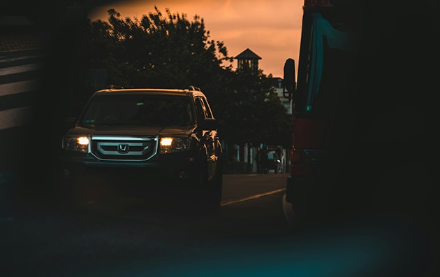 Car parked on a street at nighttime